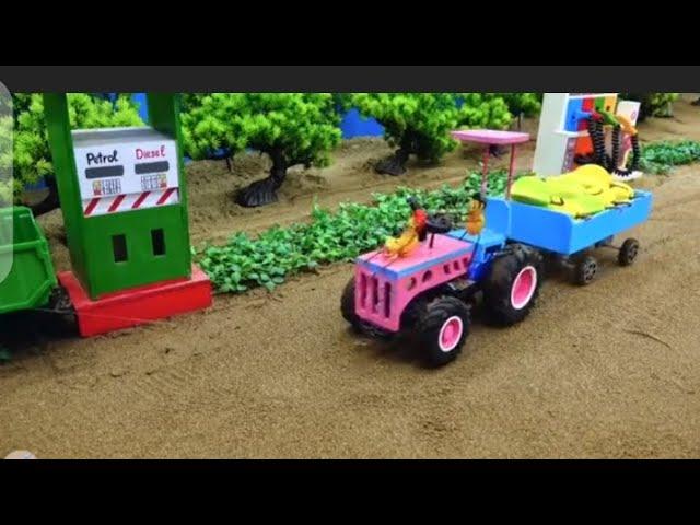 mini diy farm in which tractor is filling the fuel to petrol pump and farmer growing crops #mini#diy