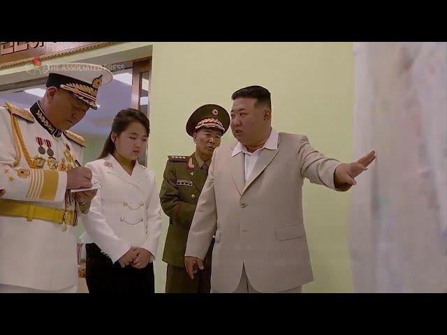 North Korean leader Kim Jong Un and daughter visit Navy headquarters