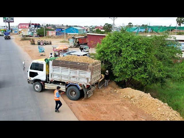 Perfect action Dump truck unloading soil filling up & Technique operator Bulldozer Working push soil