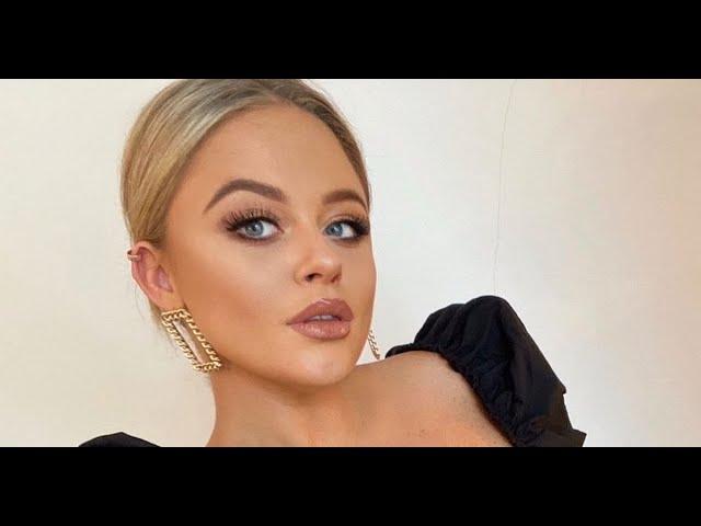 Emily Atack bares cleavage as she teases 'naughty' side in daring frontless top