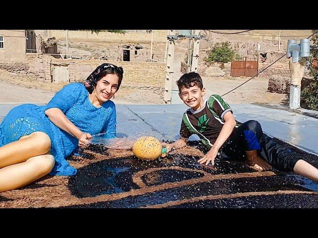 Rural Life Iran: Carpet and Clothes Washing in the Village