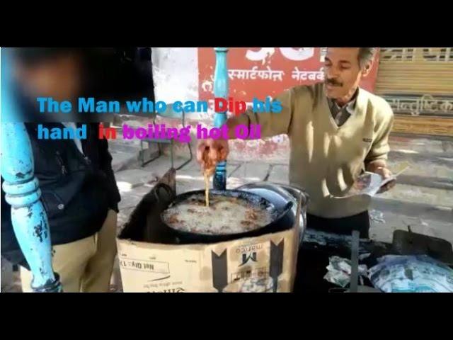 Hands In Boiling Oil Chef Fries Food in his Hands shocking video