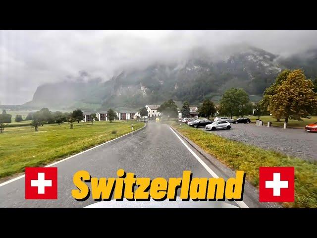 Driving from maienfeld switzerland to zurich In cloudy and rainy weather