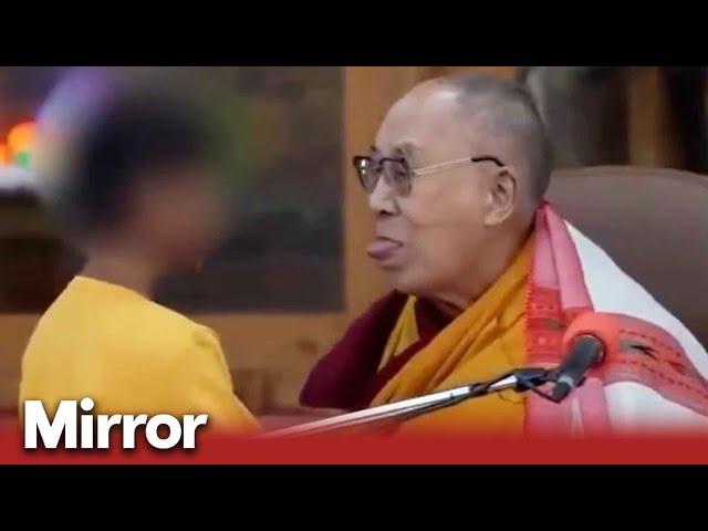 Dalai Lama asks little boy to 'suck my tongue'