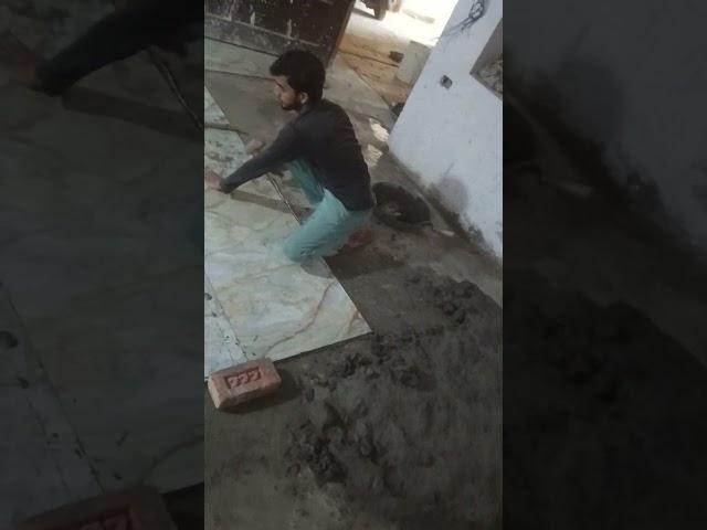 Aarif Tiles working