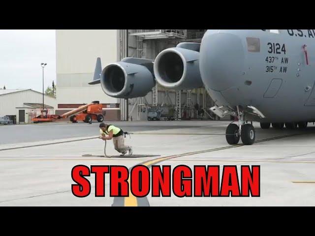 AMAZING STRONG MAN PULLING ONE OF WORLD'S LARGEST PLANES (2018)