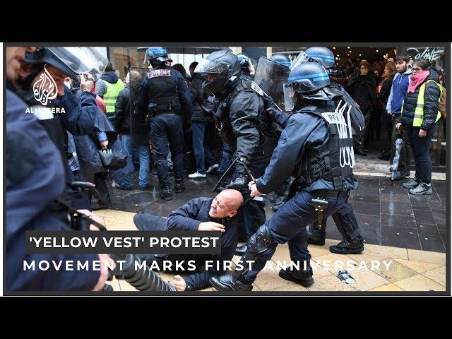 Paris police, protesters clash on 'yellow vest' anniversary