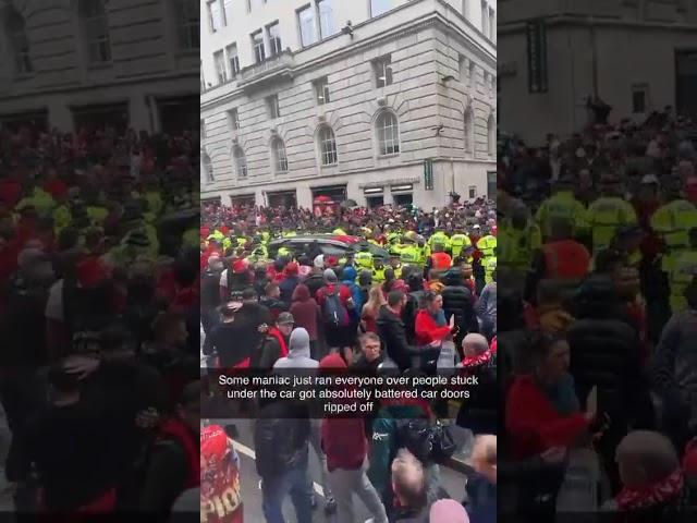 Car driven into crowd of Liverpool fans.