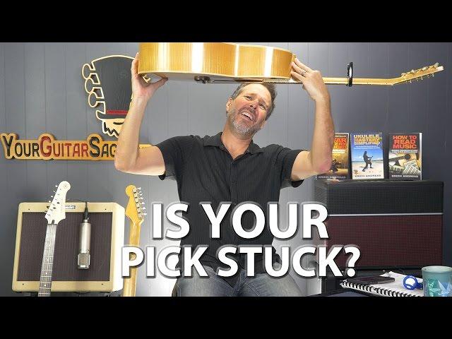 The Fastest and Easiest Way to Get a Pick Out of an Acoustic Guitar