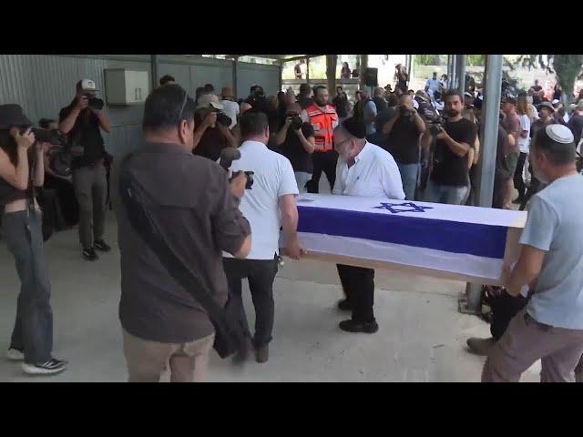 Parents speak at funeral held in Israel for Shani Louk, German-Israeli hostage killed by Hamas