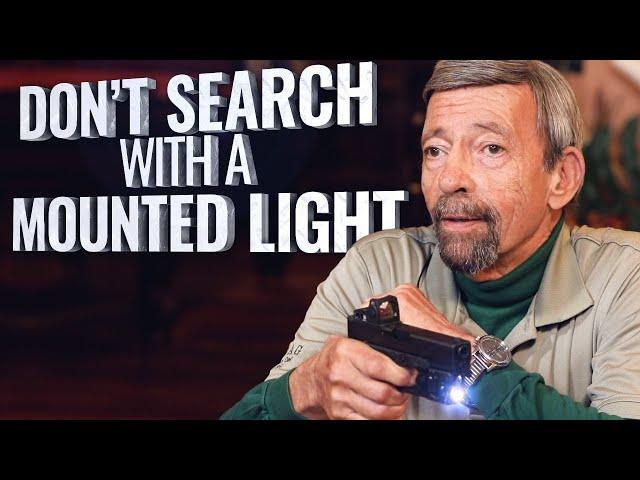 Why you shouldn't search with a weapon-mounted light on a handgun - Massad Ayoob Critical Mas EP40