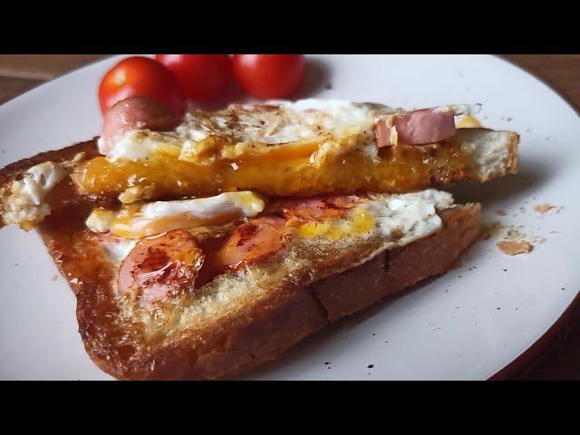 Crispy toast  with egg inside. Very  simple breakfast.