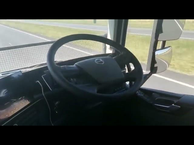 Driver films his truck driving itself on N3 freeway while he seats on the bunk