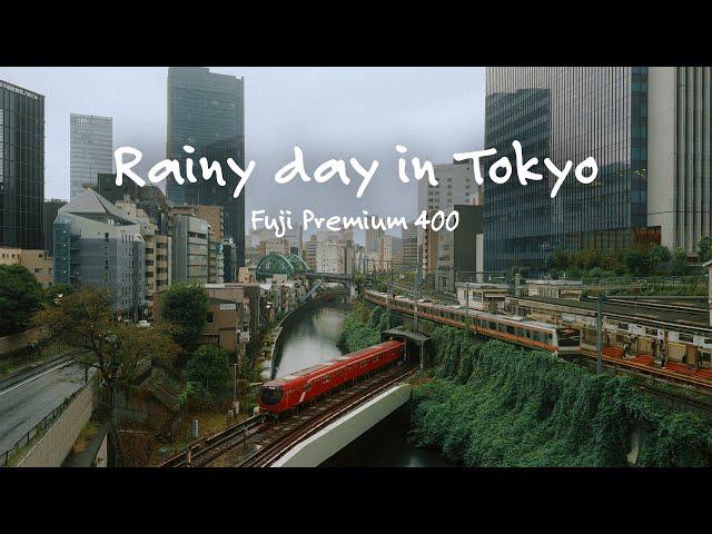 Calm Tokyo street photography in the rain.