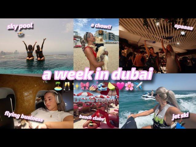 a week in dubai  | girls trip!! | flying business, aura skypool, beach clubs, dubai floods & more!!
