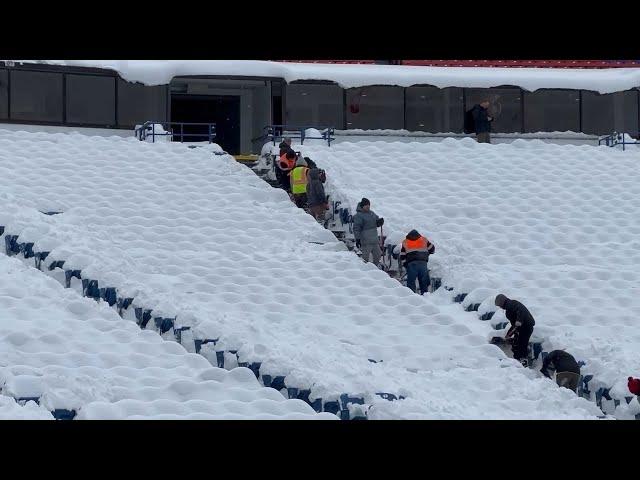 Bills fans shovel snow