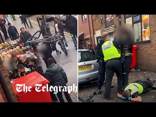 Police officers hit with bike while making arrest in Birmingham