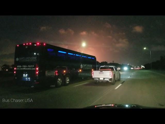 A Cool Blue Bus At Night MCI J5400