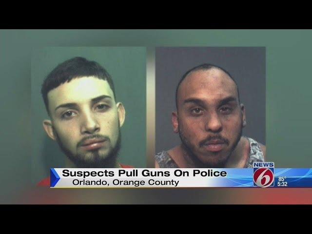 Suspects pull guns on police