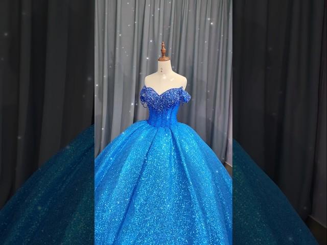 Embrace the magic of the evening in this dazzling blue creation