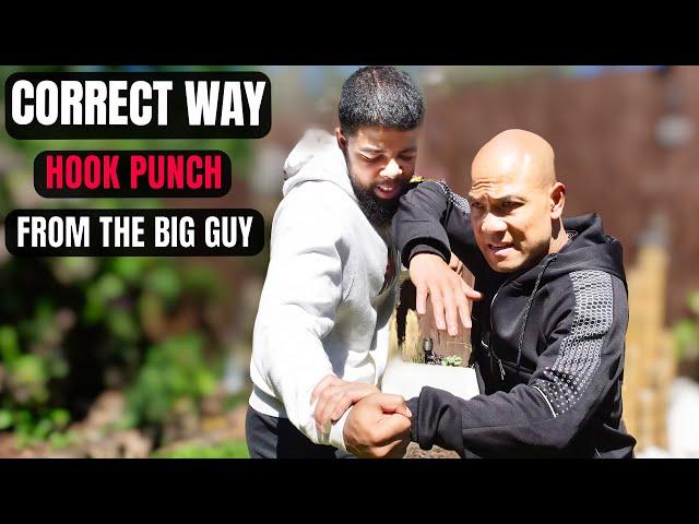 Correct way to block a hook punch from the big GUY