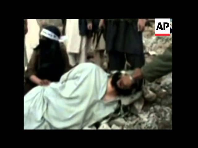 Afghanistan - Militant Video Shows Boy Beheading Alleged Taliban Traitor