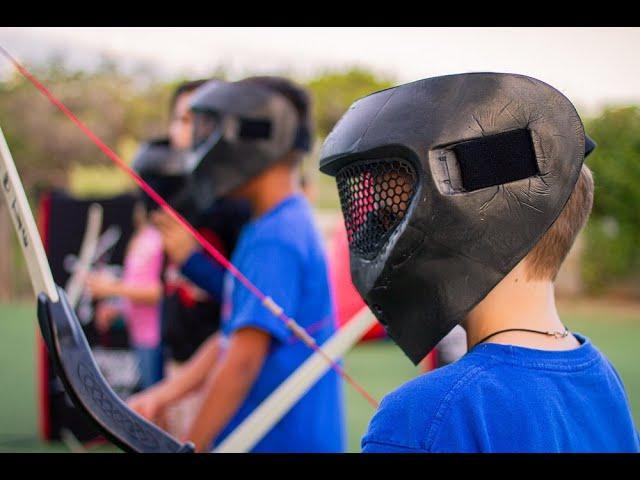 Freedom Fun Archery Tag at a Backyard Party - Played Like Dodge Ball & Popular with All Ages!