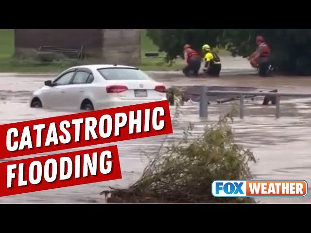 Firrefighters Wade Through Catastrophic Flooding In Westfield, Pennsylvania, To Rescue Family