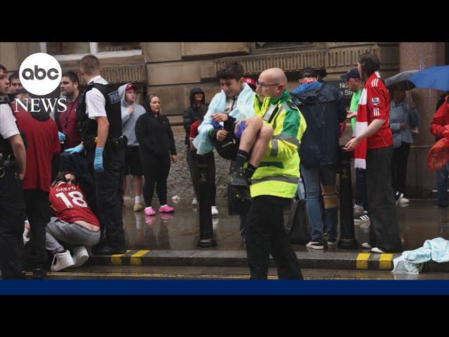 Car slams in crowd at Liverpool parade packed with soccer fans