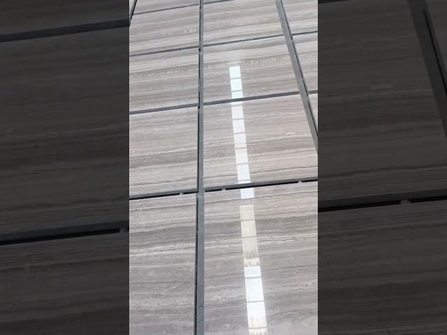 GREY WOOD MARBLE DURING DRY LAYING