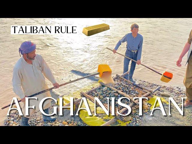 Afghan gold prospectors on the Panj river in Tajikistan