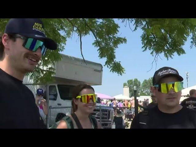 Thousands of racing fans gather at Michigan International Speedway