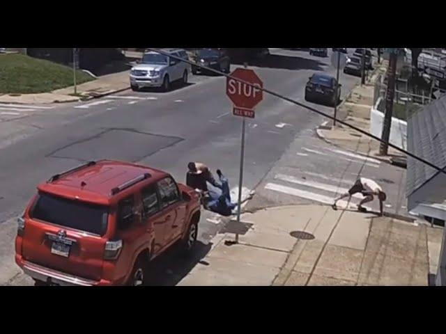 SHOCKING VIDEO: Victim of attempted robbery wrestles with one attacker, shoots another