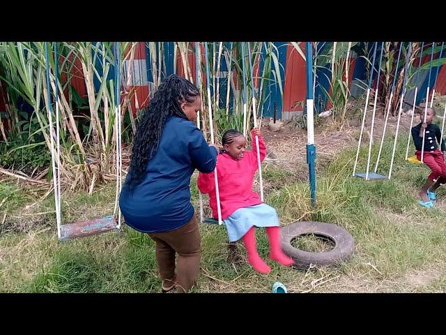 MUM VIRGINIA ALMOST FALL DOWN WHILE SWINGING AT HER KIDS  SCHOOL