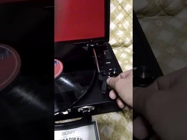 Briefcase Turntable with Frank Sinatra's Famous Hits Vinyl Record Lp