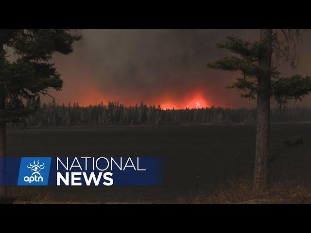 An out-of-control wildfire in northern Manitoba forces an evacuation | APTN News