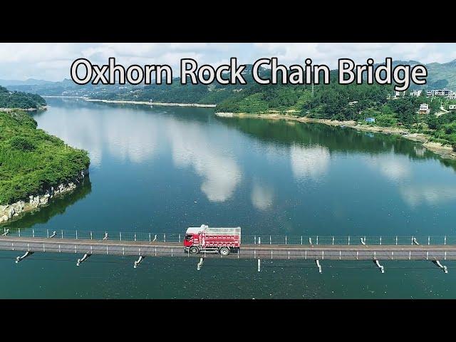 Aerial China:It’s incredible that there are cars running on the suspension bridge in Guizhou.