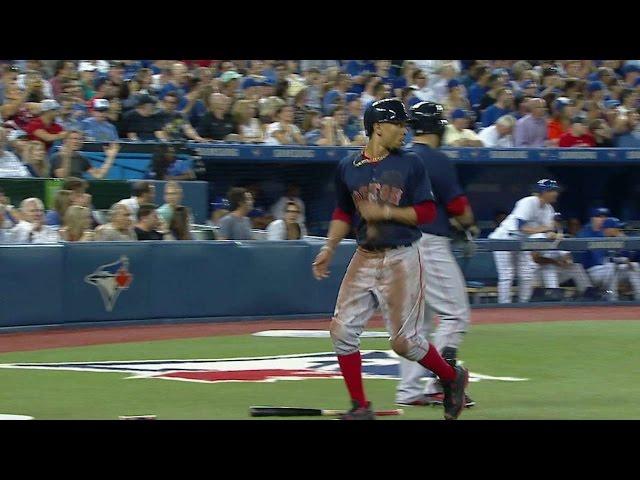 BOS@TOR: Betts runs home on Upton's fielding error