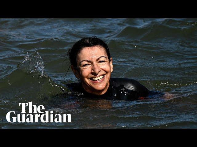 Paris mayor swims in the Seine to show it's clean enough for Olympic swimming events