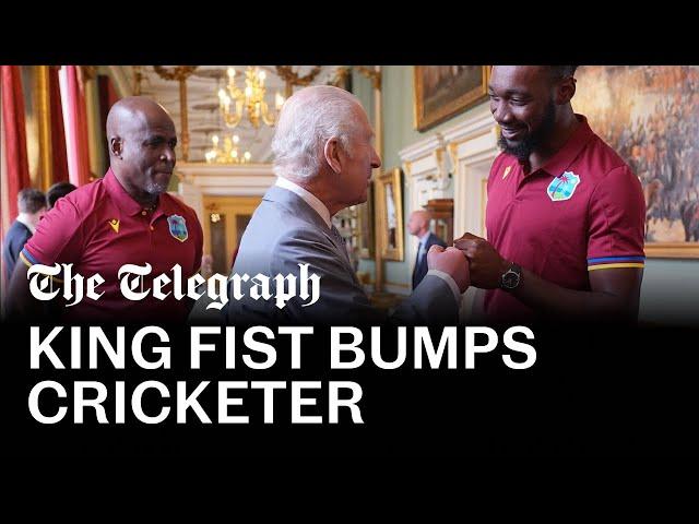 King Charles fist-bumps West Indies cricketer