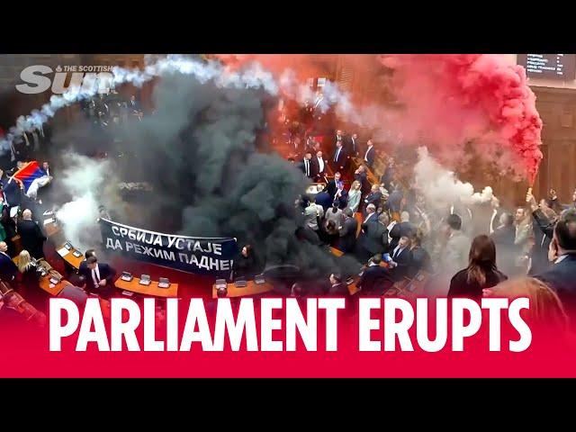 PARLIAMENT ERUPTS: Smoke grenades, tear gas, clashes as protests rock Serbia