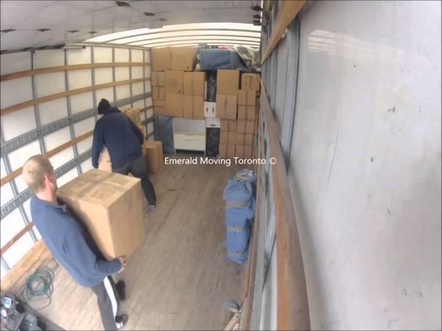 Emerald Moving 3 Man Crew loading a 26' truck