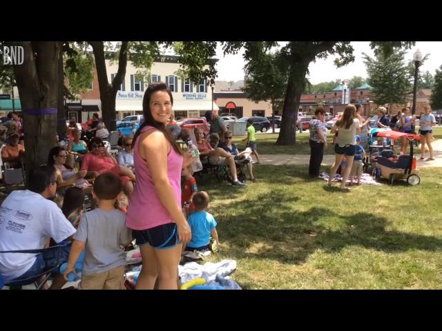 Virgil Straetor sings after the Celebrity Pie Auction