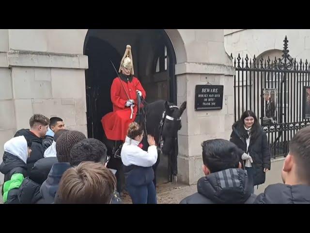 Tourist slaps horse across the  face 3 times guard shouts step back gets police #horseguardsparade