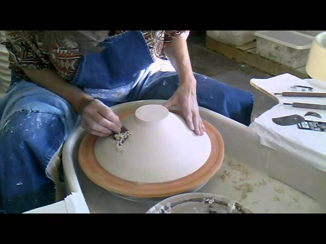 Trimming a wide rimmed Southern Ice porcelain bowl by Antoinette Badenhorst