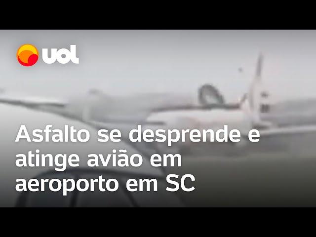 Asfalto se desprende e atinge avião comercial no aeroporto de Navegantes, em Santa Catarina; vídeo
