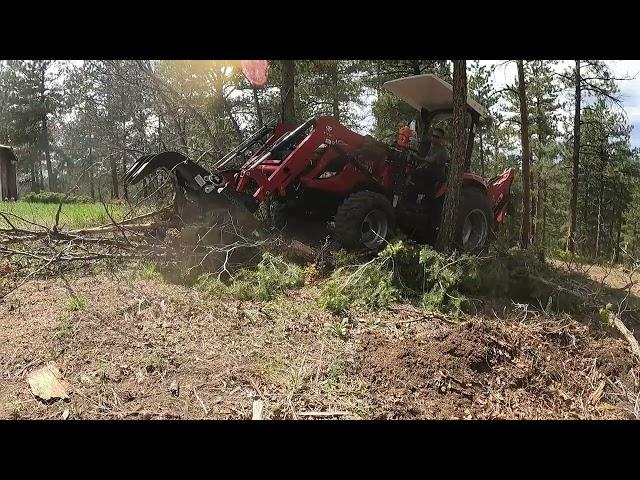 TYM 574 HST Root Grapple tearing out trees