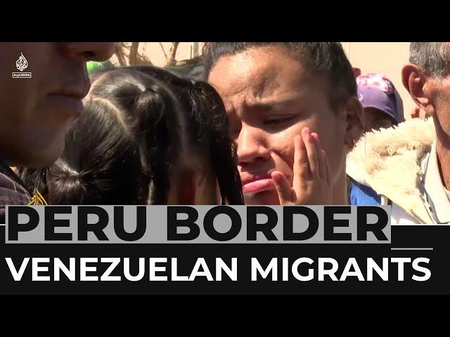 Venezuelan migrants demand to be let across Peruvian border