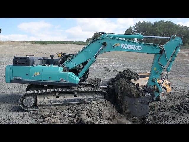 Kobelco SK500LC-11 ME loading ADTs - Part 2