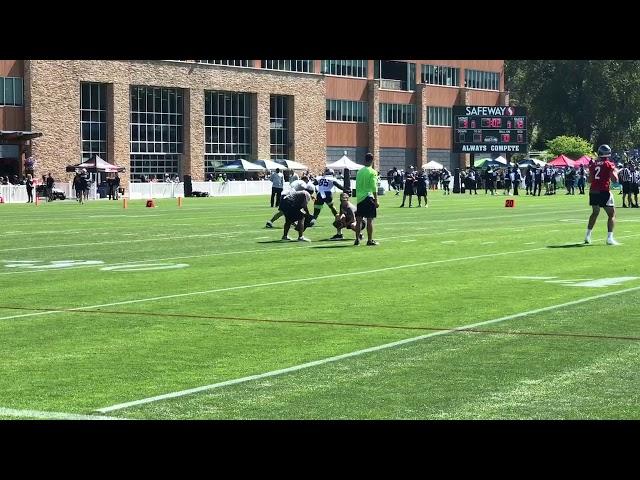Seattle Seahawks’ Jacob Hollister catches passes during training camp